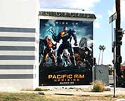 A large Pacific Rim ad on a building