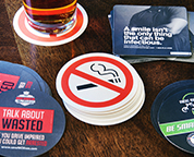 Coaster with a no smoking sign on it