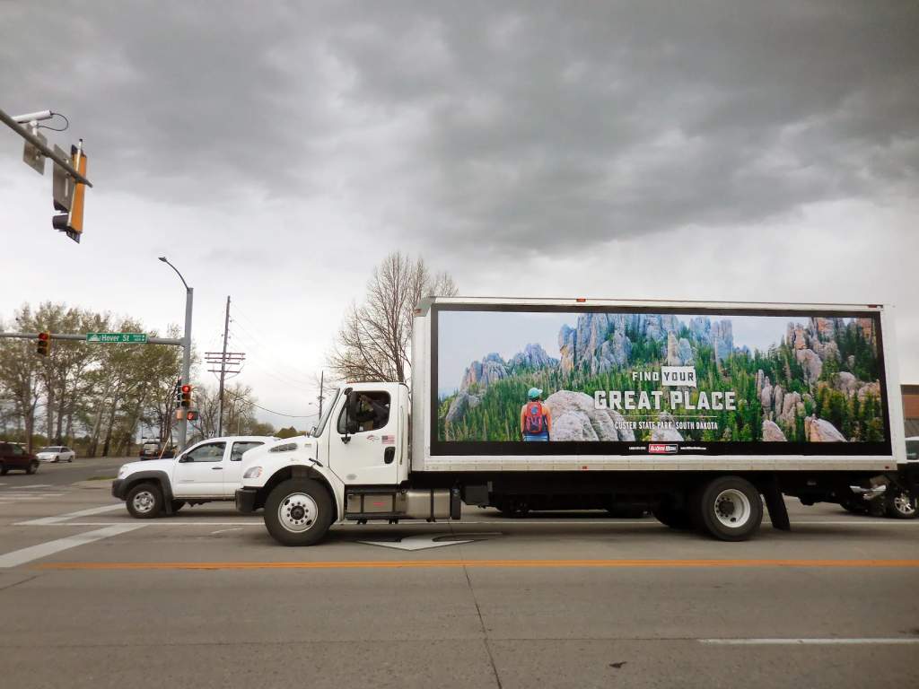 South Dakota Tourism ad on a box truck wrap