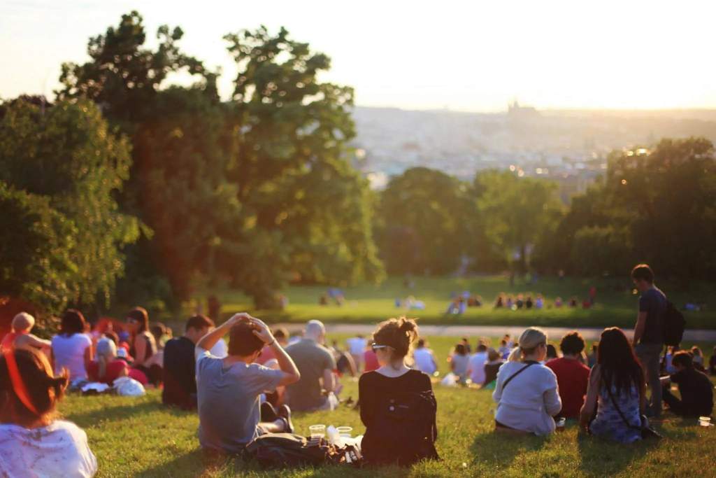 People gathered to sit and hangout at a park