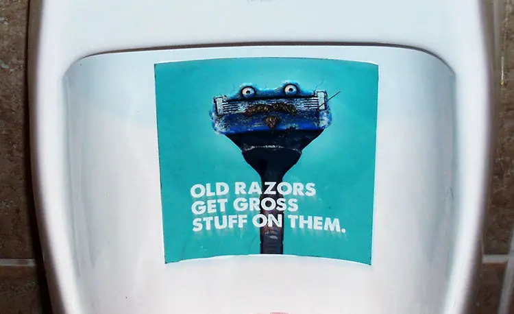 In-urinal advertisement for Dollar Shave Club