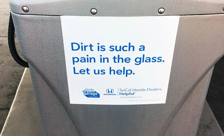 Honda ad that reads, "Dirt is such a pain in the glass."