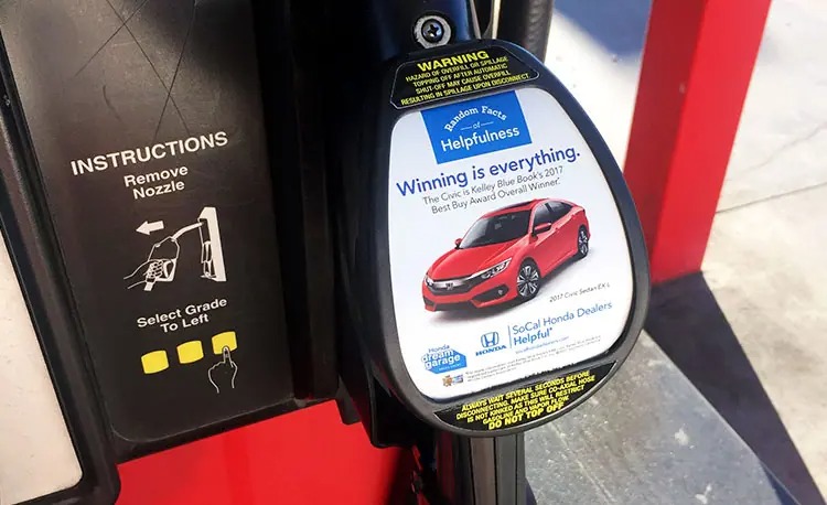 Honda advertisement on the nozzle of a gas pump