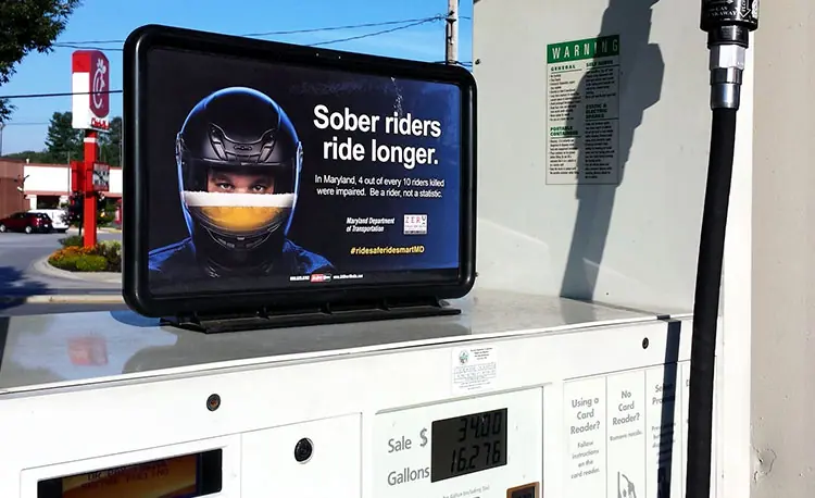 Gas pump ad that reads, "Sober riders ride longer."