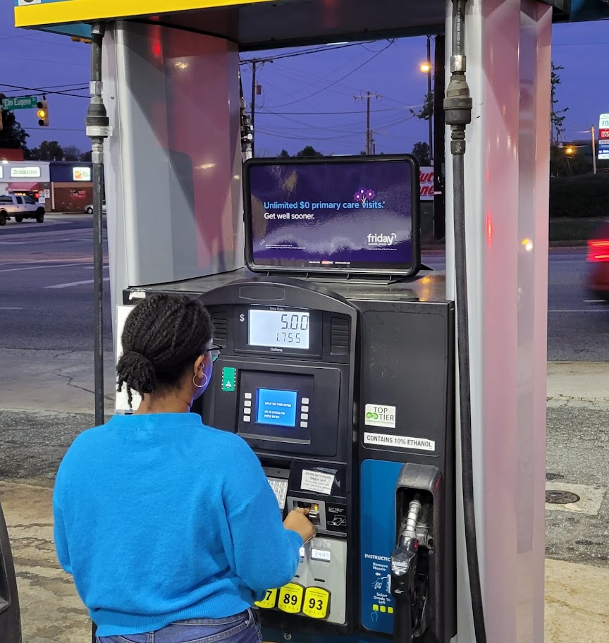 Gas pump advertisement letting people know about $0 primary care visits with Friday Health Plans