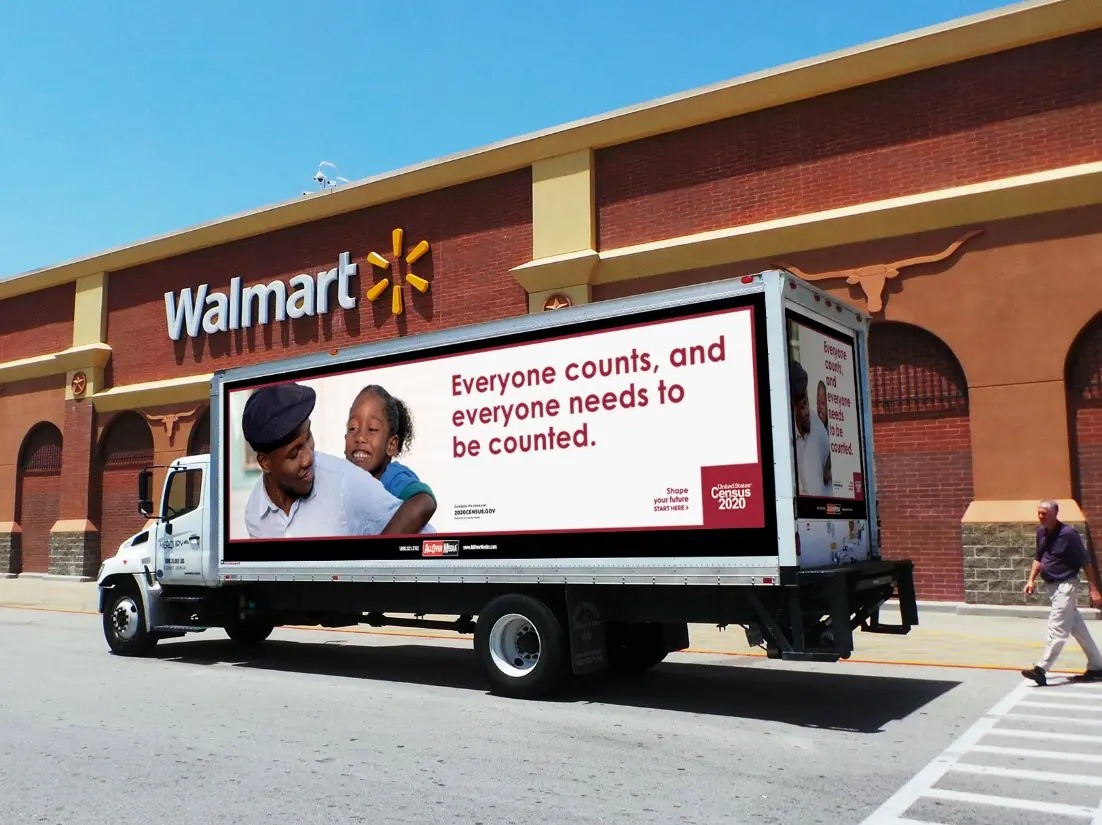 Truck-side ad to spread awareness for the 2020 Census in front of a Wal-Mart