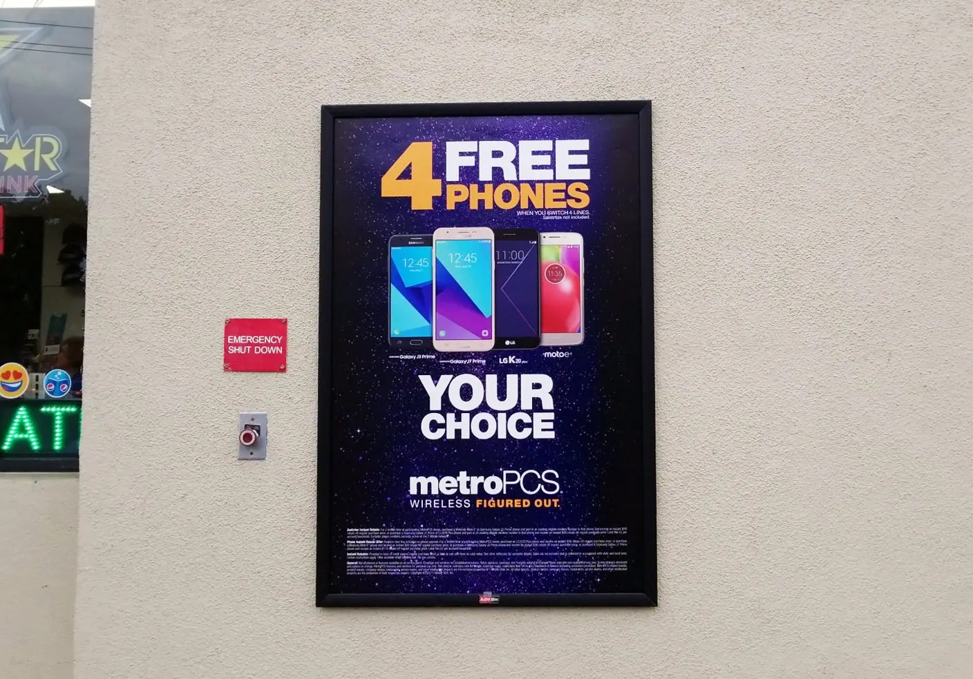 Ad poster for MetroPCS, advertising 4 free phones