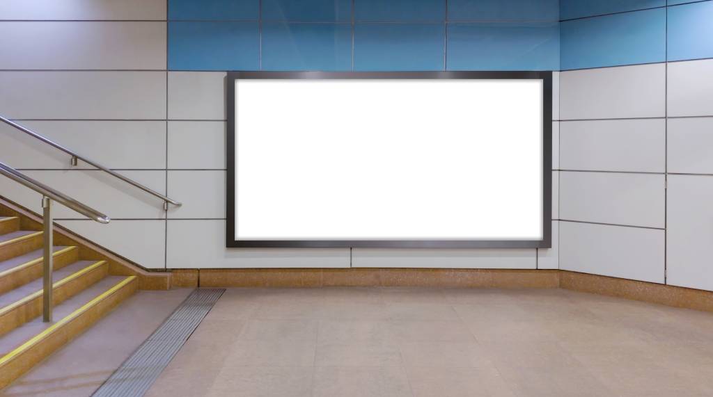 Horizontal mock up of blank advertising billboard next to a flight of stairs